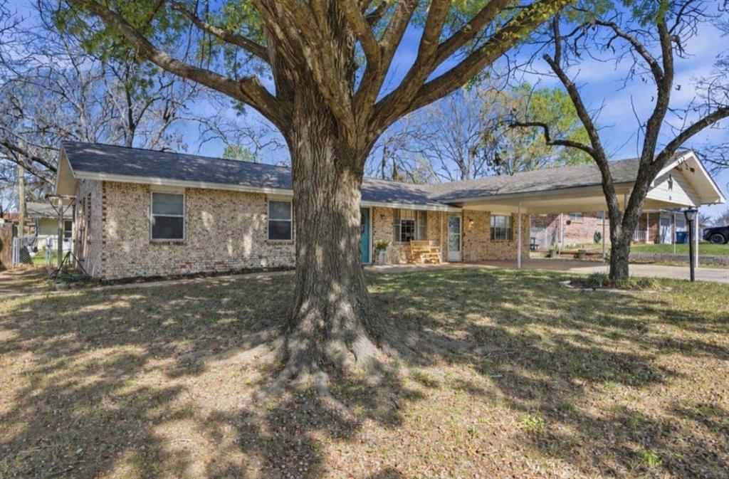Spacious, functional, and full of potential—this 3-bedroom, 2.5-bath home offers a layout that truly works for everyday living. From the moment you step inside you will see the adorable brick entry area and you’ll appreciate the generous living room that provides plenty of space to gather, relax, and entertain. The adjoining dining area flows seamlessly, creating an open and inviting feel perfect for hosting or family meals.
The kitchen offers ample cabinet and counter space, along with a convenient layout that keeps everything within reach. Just off the main living areas, you’ll find a large laundry room with plenty of room for storage and organization—something your are always looking for.
Each bedroom is comfortably sized, and the additional half bath in one of the extra bedrooms. The home has been well cared for, with some areas offering an opportunity for personal touches.
Outside is a beautifully fenced backyard with an extra workshop or storage space with water and electric to it. Great back patio with tons of yard space. 
Situated in a great location as this property offers both convenience and comfort, making it an ideal option for anyone looking for space at a great value.
Come see the potential and make it your own!