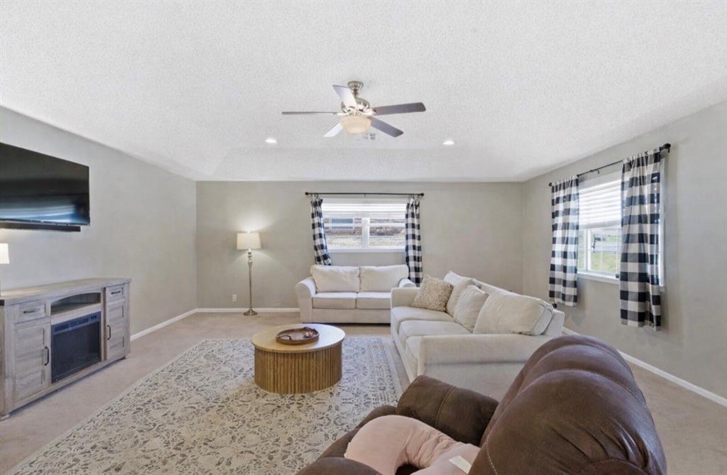 Welcome home to this spacious 3-bedroom, 2.5-bath property you are ready to call home. Offering comfort, functionality, and endless potential. From the moment you arrive, you'll be charmed by the unique brick entryway that sets the tone for the warm and inviting interior. Inside, a generously sized living room provides the perfect space for gathering with family and friends, while the adjoining dining area creates an easy flow for everyday living and entertaining.
The kitchen features tons of cabinets, open shelving and countertop space, making meal preparation and storage a breeze. The Utilitiy room offers additional storage and organization space that is often hard to find and is a MUST SEE!!!  The thoughtfully designed floor plan includes comfortably sized bedrooms, with one secondary bedroom featuring its own convenient half bath.
Outside, you'll discover a fully fenced backyard designed for enjoying the outdoors. The outside patio is ideal for relaxing evenings, weekend cookouts, or morning coffee. A detached workshop or storage building complete with water and electricity adds incredible flexibility for hobbies, projects, or extra storage needs.
This home is conveniently located in a desired neighborhood and full of opportunity. This well-maintained home offers the perfect combination of space, value, and potential. Whether you're looking for your first home, room to grow, or a property you can make your own, this one is worth a look. Schedule your showing today and imagine the possibilities!