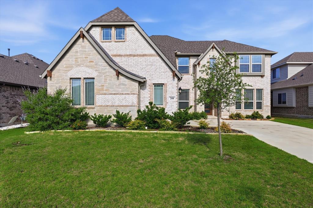 Beautiful 5 bedroom, 4 full bathroom home with great drive up appeal and an ideal layout for everyday living and entertaining! Upon entering, you are welcomed by a designated office and formal dining area that lead into the heart of the home featuring an open concept kitchen, living room, and breakfast area. Light LVP flooring flows throughout the main living spaces, while the white kitchen offers a bright and timeless feel. The spacious living room showcases cathedral ceilings, a stunning stone fireplace, and views overlooking the backyard. The private primary suite is tucked away downstairs and features an ensuite bathroom with an oversized shower, double vanities, and a large walk in closet. A second downstairs bedroom with nearby full bathroom is perfect for guests or multi generational living. Upstairs you will find three additional bedrooms and a large game room offering plenty of space for everyone. Enjoy the oversized covered patio and spacious backyard with plenty of grass for play and outdoor activities. Conveniently located within walking distance to the Ponder Independent School District schools!
