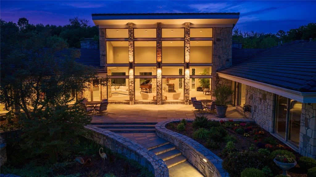 This landmark property, nestled on 35 landscaped acres within the Montecito neighborhood has been thoughtfully designed with meticulous attention to detail and functionality.  The 9,335 square foot main home includes four bedrooms, six bathrooms, multiple living and dining areas, library, and a wet bar with 480-bottle climate-controlled walk-in wine cellar.  Expansive windows frame views of the stunning grounds, which feature a 6-hole pitch and putt golf course, a bass pond, a catfish pond, tennis court, swimming pool, and spa.  Enjoy the quiet beauty of this private sanctuary as you meander through 3.5 miles of paved walking paths among mature trees, ponds, and gardens.  The 1,657 square foot Bunk House has four bedrooms, with four ensuite bathrooms, a living area, and kitchenette.  An 842 square foot Casita has one bedroom, one bathroom, a living area and kitchenette.  The property also features a 3,660 square foot airconditioned Workshop, with Hobby Room, Study, Den, two full bathrooms, and a patio.  The 973 square foot greenhouse is heated and cooled for year-round enjoyment.  This is a rare opportunity to own one of the last truly magnificent estates in Denton.