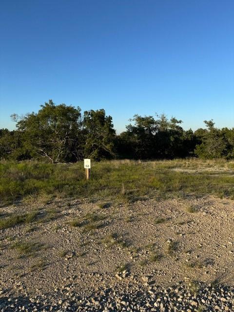 Craving space, peace, and killer sunsets? This nearly 4-acre cul-de-sac lot in gated Sunrise Mountain Ranch checks every box. You’re outside city limits with gently rolling land, mature trees, and long-range views—plus wired fiber-optic internet so work (and streaming) stay fast. The community plan adds fun stuff like a clubhouse, pool, park spaces with pavilions, picnic areas, and ponds.
Want flexibility? Build a barndominium (1,400+ sq ft) or a tiny home—both welcome here. Weekends are easy: lakes and rivers nearby, wineries for a slow afternoon, and historic downtowns in Stephenville, Glen Rose, Granbury, and Hico for shopping and bites. Take the kids to Dinosaur Valley or roll through Fossil Rim; catch a Tarleton State game when you want a little college-town energy.
Bottom line: this is a peaceful, picture-ready spot to design exactly what you want—sprawling estate or cozy retreat. Come see the land, breathe the fresh air, and start planning your country-life porch sittin’.