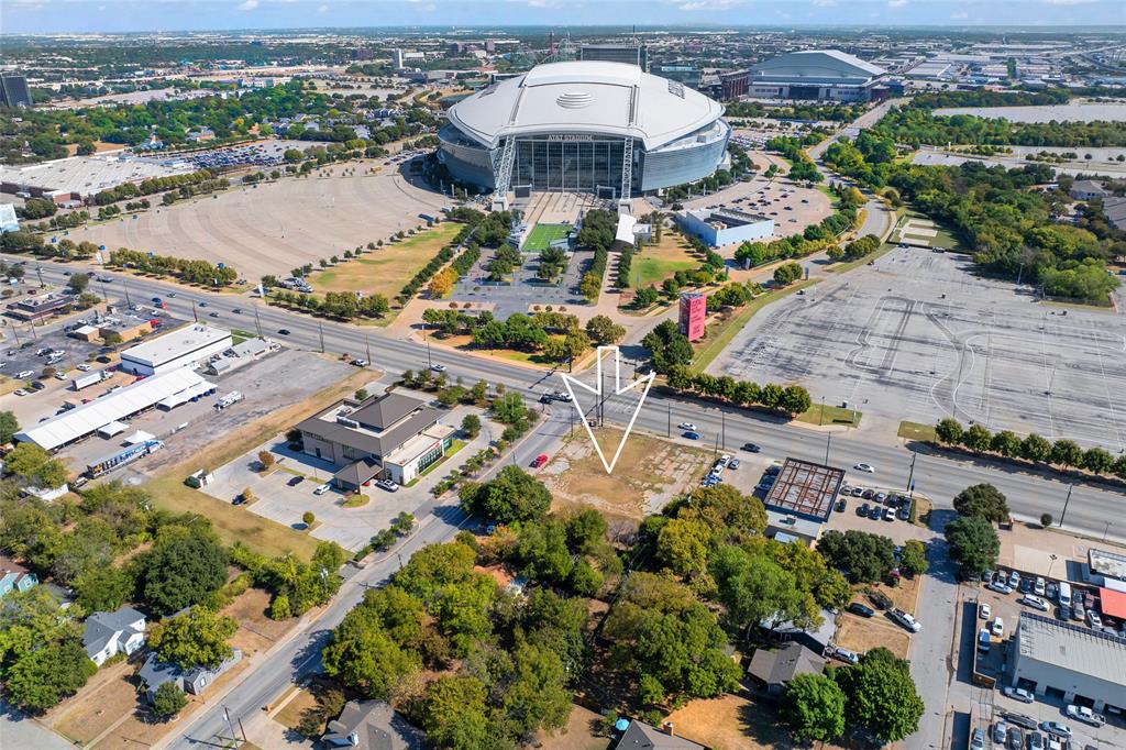 Arlington Entertainment District offers this EXECLLENT and once in a life time special Commercial corner lot location for any and ALL Developers. It comes with endless opportunities and possibilities to welcome everyone coming in from all over the world, our states, other countries or those who simply live within the DFW area to catch all the those special events at AT&T Stadium.  As soon as you cross the street you are steps away from the door to enter the Dallas Cowboys AT&T Stadium.  Located and surrounded by main numerous attractions such as Six Flags, Texas Live, Globe Life Field, Texas Live by Lowes Hotels, UTA, & the List goes on as it continues to grow! 
This property and 2 other properties are being sold all together as a package.  Each Property is individually priced.  
MLS 20768280 is over half an acre Commercial Corner Lot and it is being sold as a package with 2 additional single family properties that are adjacent to each other.  
NOTE: All the MLS Numbers are as follows 1. MLS 20768280 (Commercial Vacant Corner Lot),  2. MLS 20768256  (Yellow house 706 E Rogers) and 3.  20768269.(Yellow house 708 E Rogers), All adjacent to each other is 818, 706 & 708 E Rogers St. Each property is individually priced, please see the other MLS Listings mentioned being sold with this Listing.