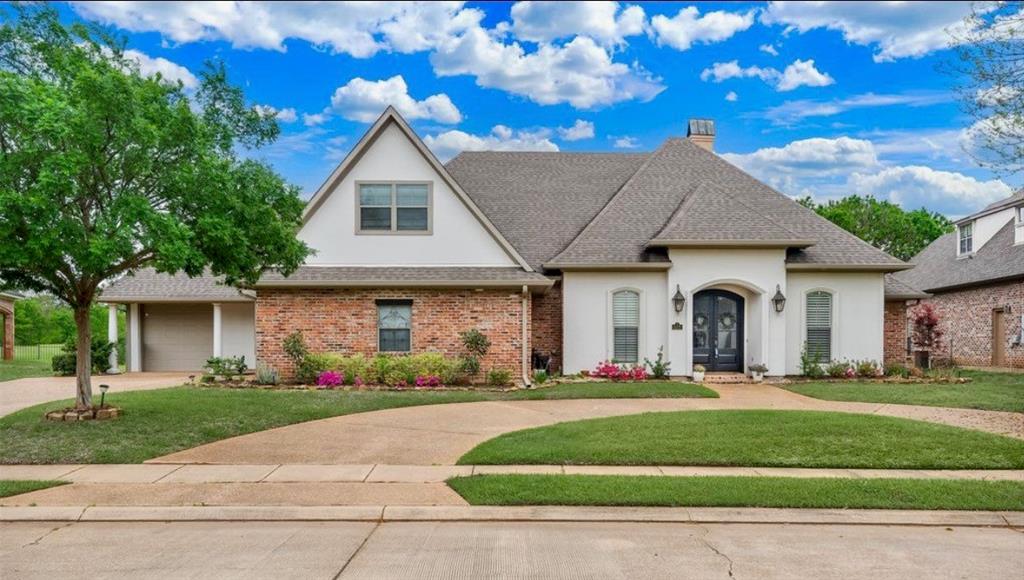 Nestled on the 4th fairway of the Stonebridge golf course, this updated and upgraded 5-bedroom, 4.5-bathroom home is sure to impress! The front circle drive and mature landscaping offer immediate curb appeal as you arrive. Inside, the attention to detail throughout is evident and the open and airy floorplan is sure to be an entertainer's dream. The spacious living room features floor-to-ceiling windows overlooking the golf course, a cozy fireplace, and ornate molding to give the space an elevated feel. Flowing from the living room is the modern kitchen, breakfast nook, and hearth room with its own fireplace. Whether you're hosting a dinner party or simply having a quiet weeknight meal, the upgraded appliances, sleek counters, and custom cabinets are sure to make it a breeze. Additionally, the separate formal dining room offers even more options for hosting. The remote primary suite will be the perfect space to unwind after a long day with its spa-like ensuite bath boasting a floating vanity with dual sinks, a custom tiled shower, and luxurious soaking tub. The three additional bedrooms downstairs each have an updated ensuite bath, offering privacy and convenience for guests and family. Upstairs, the oversized 5th bedroom offers the flexibility to be used as a bedroom, a game room, or dedicated office space, whatever suits your unique needs. A media room and 4th full bathroom complete the second floor. Outside, the extended back patio gives you plenty of room to host summer BBQs or just enjoy time outdoors. With an expansive backyard, you have the option to install a pool, a firepit, or create a garden! Community amenities include the golf course, a clubhouse, a pool, and tennis courts plus a guarded entrance. This home just might be your next dream home - schedule your private tour today and envision the possibilities!