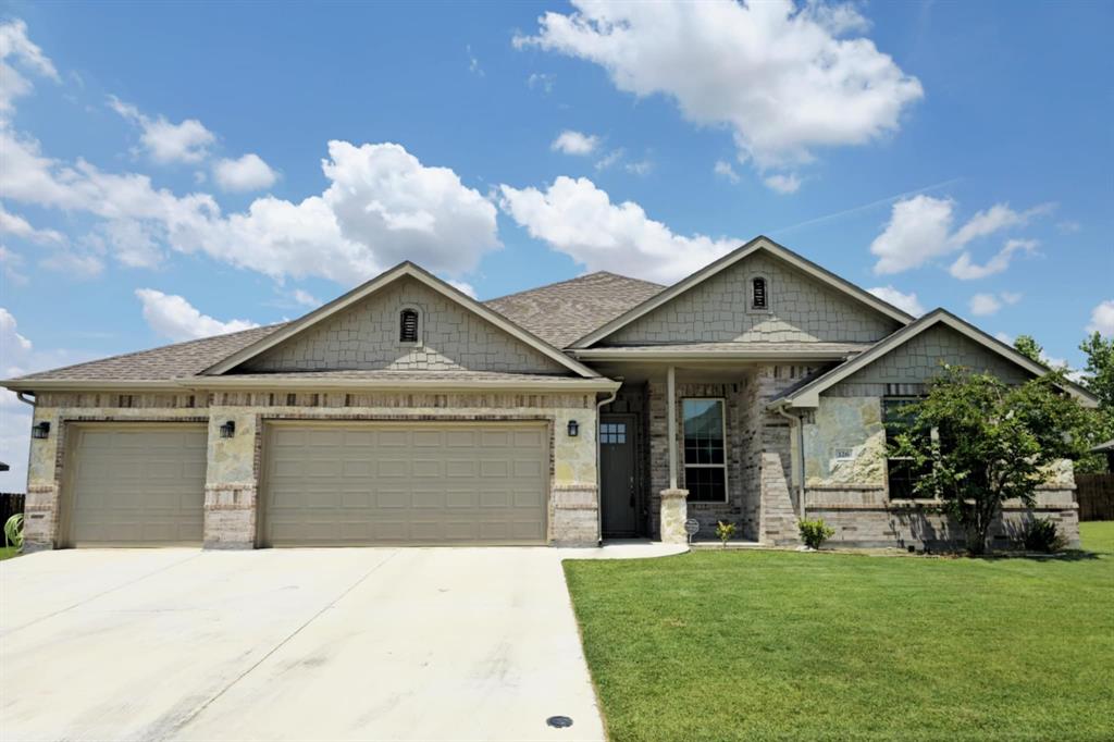 THIS IS THE ONE! Only 5 yrs old, this home is stacked with upgrades like laminate floors with noise absorption, extra recessed lighting, gas fireplace, entry built-in, security system, blackout window shades, 3 car garage, and an oversized backyard. Just installed 10-2025 a 30 year class 3 impact resistant shingle plus 3 year craftsmanship warranty. The 4 bedroom 2 bath has a welcoming entry that leads into open concept living featuring a spacious living room, kitchen with dining, granite counters and island, pantry, coffee nook, and stainless steel appliances. Located at the front of the home is a 3 bedroom cluster with full bath. The isolated primary bedroom is spacious with attached bath that has all you need including a large vanity, soaker tub, separate shower, walk in closet, and private toilet. The backyard won't disappoint! It is well maintained, private, and has plenty of room for kids, pets or a pool. No residential homes will be built behind this home!