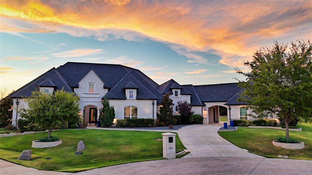 Welcome to your private oasis, nestled at the end of a serene cul-de-sac in Prosper’s prestigious Christie Farms community. Custom built in 2017, this exquisite 5,473sf Dave R Williams estate offers luxury living at its finest, with 5 spacious bedrooms, each with an ensuite bath, and two additional half baths for convenience. Drive through a gated portici che to the 4-car garages, or enter through the front courtyard, and you'll be greeted by a stunning foyer that seamlessly blends the outdoor beauty with the interior living of this masterpiece. The gourmet kitchen, centered around a large quartz island, is equipped with Wolf and SubZero appliances, perfect for casual family meals or culinary experiences. Entertain with ease in the expansive game and media rooms for hosting family and friends. The home is lined with oversized windows, flooding the space with natural light and offering breathtaking views of the lush, tree-lined acre lot that ensures ultimate privacy. Step outside to experience the true essence of indoor-outdoor living. The expansive patio flows effortlessly from the main living area, providing an ideal setting for both daily relaxation and large gatherings. The meticulously landscaped grounds feature a pristine pool, newly expanded pool deck and hardscaping, turf putting green, pergola covered outdoor kitchen, and a fire pit, making this property a haven for luxury and leisure. Generac Home Generator, Vaulted Safe Room, Whole Home Water Filtration & RO. Don’t miss this rare opportunity to own an exclusive East Prosper estate. Cockrell Elementary, Rodgers MS, and coveted Walnut Grove HS!