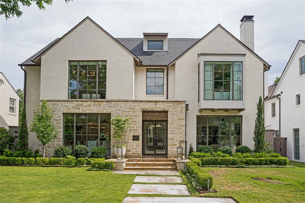 3421 Southwestern is a stunning transitional masterpiece in the heart of University Park, thoughtfully designed for both elevated entertaining and everyday living. Completed in 2020 and situated on an exceptional 70x160 lot, this custom pier-and-beam residence blends timeless architecture with warm modern sophistication.

A dramatic three-story staircase anchored by rich wood paneling and a breathtaking two-story window creates an unforgettable first impression, flooding the home with natural light from every angle. Expansive windows throughout the residence beautifully connect the indoors to the outdoor living spaces, creating an airy and inviting atmosphere.

The oversized great room seamlessly opens to the gourmet kitchen, designer bar, and expansive covered outdoor living area, offering the perfect setting for intimate evenings or large-scale entertaining. Every detail has been curated with both beauty and functionality in mind.

The home features 5 spacious bedrooms, 6 full bathrooms, and 2 powder baths, along with dedicated his-and-hers offices designed for today’s luxury lifestyle. The private primary suite serves as a true retreat, complete with vaulted ceilings, a serene sitting area, an oversized spa-inspired bath, and extraordinary custom closets.

Additional highlights include elevator-ready construction, an expansive rear swing driveway with ample additional parking or sport court potential, and exceptional craftsmanship throughout. Sophisticated yet comfortable, 3421 Southwestern is a rare offering that perfectly captures refined living in one of Dallas’ most coveted neighborhoods.