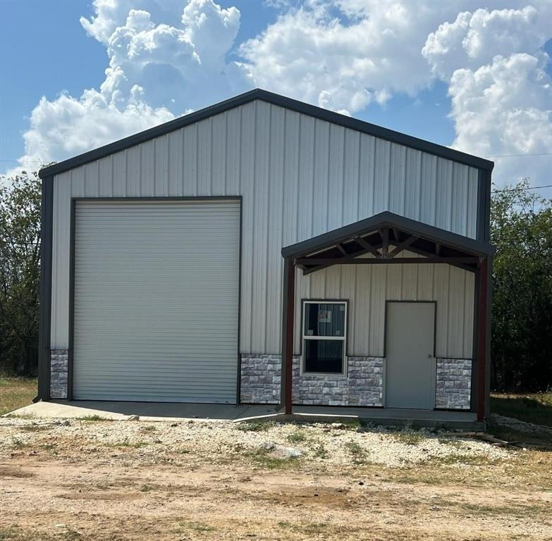 Lake Whitney Barndo is for sale. The building is 30 feet by 50 feet in length. It is designed for parking your RV on one side with all the hook-ups in place and building out the other side with living quarters. A new septic system, water meter, and electricity have already been established. The seller will finish out the living quarters for an additional fee.