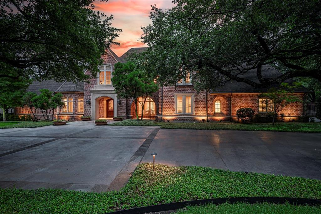 This exceptional pier and beam home was custom built by Barry Buford Builders in 2005-2006 for the current second generation owners. Nestled among towering trees planted by original owners 70 years ago thrive on the quiet circle of refined residences. Meticulously maintained  spaces can be enjoyed for years to come. Gleaming hardwood floors in 5 living areas have flexibility of usage devised in detail. A future elevator shaft is in the construction plans. Adjacent to the inviting entry is a study, music or card room. A guest suite  on the 1st floor is very private. The primary suite is secluded with serene views of the lushly landscaped yard illuminated by Lentz and Seaman’s lighting and features large flower pots watered by an automatic sprinkler system. There are walk-in closets and a small exercise-storage room. Heated marble floors and an air jetted tub along with a walk-in shower enhance the elegant bathroom. The welcoming family room has a wall of built-ins for a flat screen TV. The speakers and sub woofers remain. Surround sound can stream music into the living and family rooms and patio.  A powder room is accessible from the heated saline pool and spa. A formal powder room is located near the living room . The chef’s delight kitchen contains a large island, gas cooktop, double ovens, 2 warming drawers and a Subzero refrigerator. The breakfast room with built-in desk has pool vistas. A loggia sunroom , an office-playroom, bonus exercise-craft , mud and utility room with freezer remaining complete the downstairs. Upstairs finds a generous gameroom and 2 more bedrooms, one with a private bath and the other with access to a full bath. Pella windows and plantation shutters are found throughout the home. Numerous other amenities include a 2 car garage, a 1 car garage, a Generac generator, an in house fire sprinkler system, an automatic water shut off,  bar and  pantry icemakers and 2 gas log fireplaces.  Agent is related to sellers.