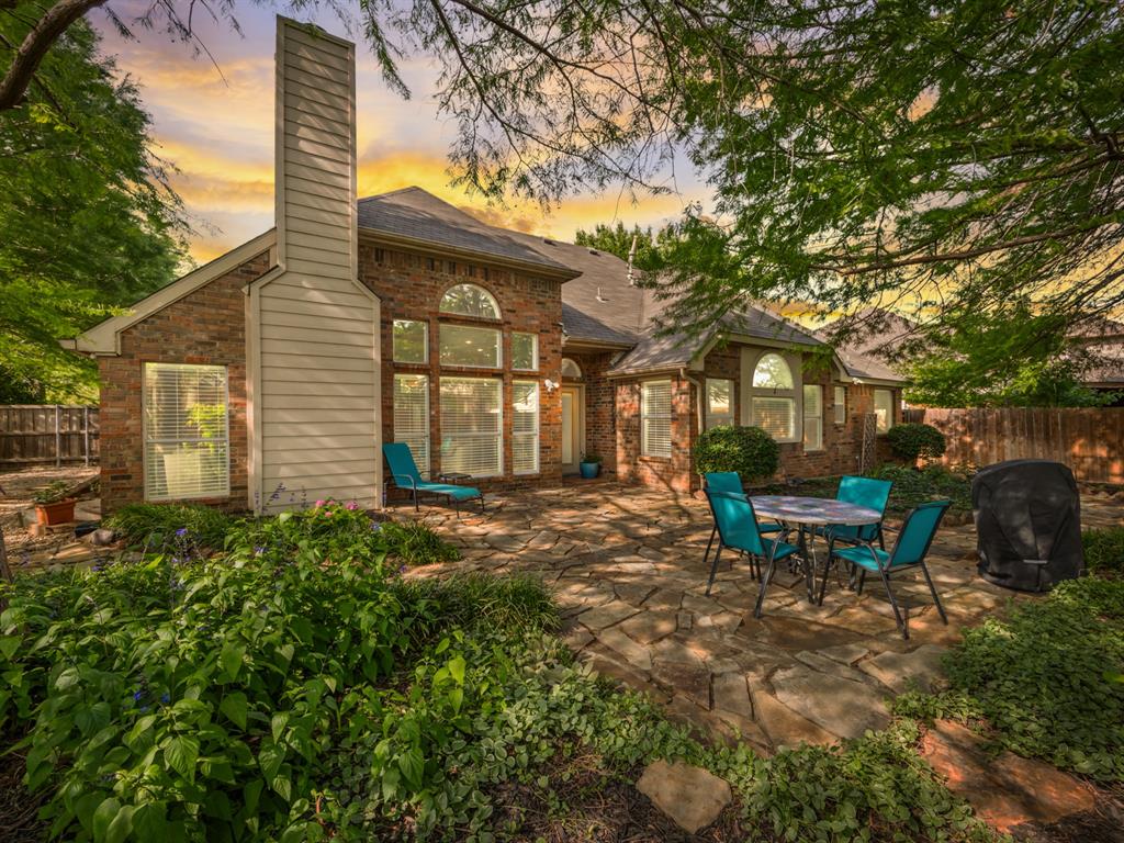 With over 1,800 square feet, this home offers the size of many three-bedroom homes, with the two secondary bedrooms opened into ONE LARGE FLEX ROOM! There are so many ways this flex room can be used, a nursery and playroom, an older child’s bedroom with space for gaming or homework, a private suite for mom and or dad, a roommate setup, live-in health provider space, a dedicated home office, sewing or quilting room, art studio, hobby room, and more. The possibilities are endless! Do you dread mowing the lawn? You won’t here, because there is NO GRASS! The front yard features Asian Jasmine ground cover instead of grass, drought-tolerant, low maintenance, and beautiful. The backyard is filled with gardens, flowers, plants, and herbs, creating an enjoyable, private, and peaceful outdoor space. The large fenced-in side yard could also be converted to a shady, separate dog run. Enjoy cooking and entertaining? You’ll love the open floor plan with updated stainless steel appliances, a dining room, breakfast room, breakfast bar, and a large, shady stone patio perfect for grilling and relaxing.