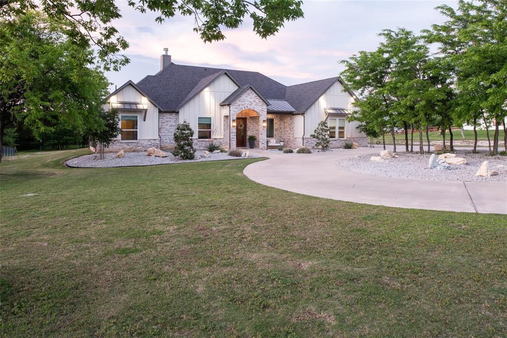 Set on 1.15 acres of quiet Texas countryside, this beautifully designed 4-bed, 4-bath home offers the comfort of newer construction with the peace of mind that comes from thoughtful planning. Built just three years ago, the home was intentionally engineered for resilience during DFW’s extreme winter freezes, featuring no plumbing in exterior walls, a tankless water heater in an insulated crawl space, and a wood-burning fireplace with gas starter to keep the home warm even during power interruptions.

The 3,195-sq-ft floor plan lives large with inviting natural light, flexible spaces, and a seamless flow ideal for everyday living and entertaining. Whether you’re enjoying the wide-open acreage, gathering around the fireplace, or appreciating the low-maintenance, turn-key condition, this property delivers a lifestyle that feels both grounded and elevated.