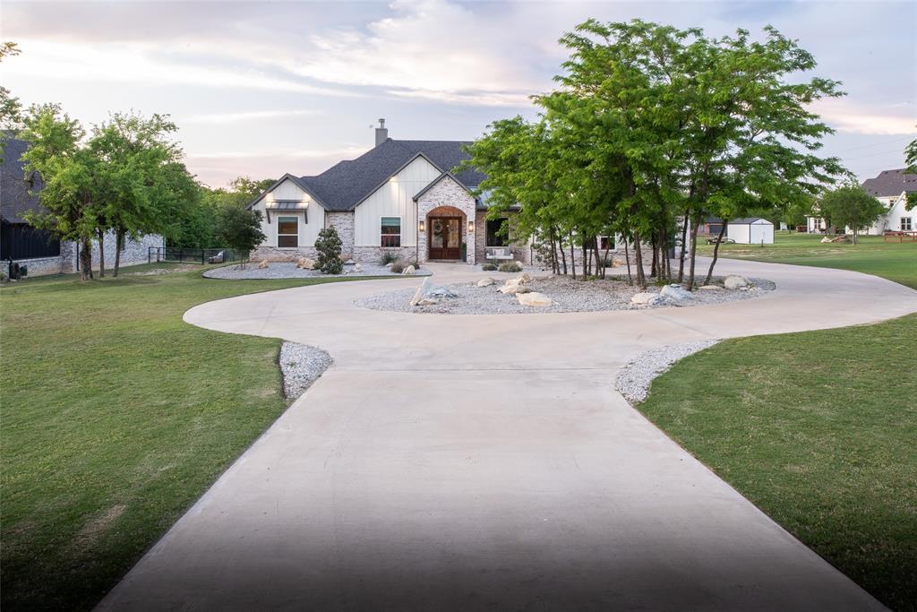 Set on 1.15 acres of quiet Texas countryside, this beautifully designed 4-bed, 4-bath home offers the comfort of newer construction with the peace of mind that comes from thoughtful planning. Built just three years ago, the home was intentionally engineered for resilience during DFW’s extreme winter freezes, featuring no plumbing in exterior walls, a tankless water heater in an insulated crawl space, and a wood-burning fireplace with gas starter to keep the home warm even during power interruptions.

The 3,195-sq-ft floor plan lives large with inviting natural light, flexible spaces, and a seamless flow ideal for everyday living and entertaining. Whether you’re enjoying the wide-open acreage, gathering around the fireplace, or appreciating the low-maintenance, turn-key condition, this property delivers a lifestyle that feels both grounded and elevated.
