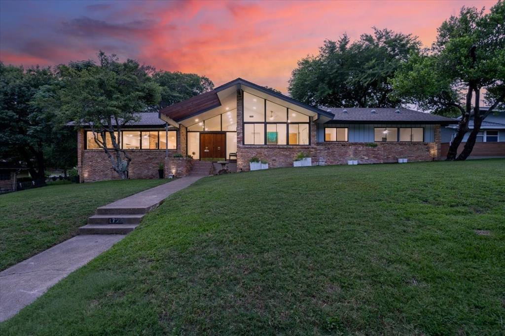 Welcome to a spectacular mid-century modern home in Wynnewood Hills, walking distance to the Golf Club of Dallas, just 15 minutes or less from the  Bishop arts district , Trinity Groves and Downtown. This architectural gem was featured in a 1958 Dallas morning news article written by Jeanne Barnes.  The builder was George Sebastian Sr of Sebastian Construction . The home leverages its enlarged footprint to create a flowing layout defined by striking geometric sightlines, soaring vaulted ceilings, 3 fireplaces, and unforgettable entertaining spaces. Make a grand statement the moment guests arrive in the foyer, which boasts rich brick paving into the den area, a massive floor-to-ceiling brick accent wall, and double mid-century walnut entry doors framed by geometric transom windows and frosted-glass privacy side panels. From there, descend a short flight of brick steps into the heart of the home: the ultimate sunken conversation pit. This main living tier features a dramatic floor-to-ceiling brick fireplace , exposed structural wood beam and Brick flooring . Enjoy the beauty of open-concept living without sacrificing structural character, thanks to iconic architectural dividers like the white accent wall with its stylized oval cutout and integrated wood display shelves, alongside a custom-designed geometric half-wall screen separating the upper landing from the main living tiers.  This residence offers an array of versatile bonus spaces, including dedicated, light-filled sitting nooks  perfect for a music room, home library, gym, or private art studio. These expansive casual areas flow naturally into a open kitchen. Amazing views of the backyard oasis? through a wall of  windows and double French doors, framing tranquil views of a sparkling in-ground pool ,slide and diving board. Properties of this scale and architectural significance rarely come to market. Don't miss this rare opportunity to own a piece of mid-century modern history.