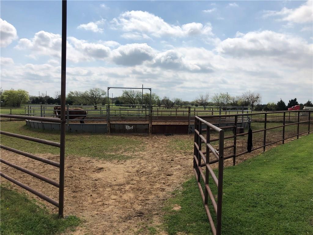 Great for future development in a HIGH DEMAND area on FM 428, this beautiful 54.7 acres property is currently used as a Equine business with barns, round pens, & outdoor track pad. The Ranch style House has 3 bedrooms, 2 bth home with a converted garage for mudroom and full size office. Master Bedroom has ensuite, 2nd Bath is between bedroom 2 and 3. Back Porch overlooks equine facility. Gated entrance with access code. Pipe & cable fencing. Show Barn:21 stalls, Stud Barn:10 stalls with storage & room that can be converted to full lab. Shed Row: 7 stalls. Attached to the show barn is a covered area large enough for longeing or riding on cold or rainy days. 6 stalls that line the back wall of this attachment.