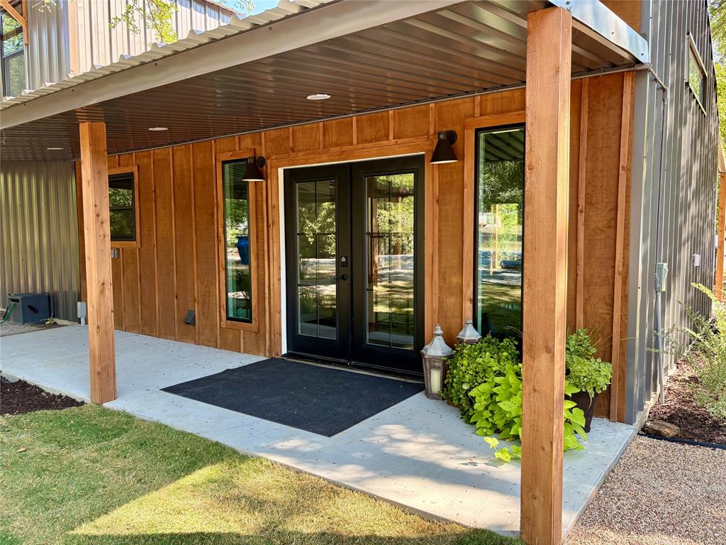 Beautiful brand new built barndominium on Lake Leon.  This 3 bedroom 2 bath home has gorgeous tree filled one acre lot with boat dock, and double back porches for entertaining and taking in the lake views.  The interior is gorgeous with high end quartz countertops and a spa like feel throughout the home.  The exterior has been landscaped and is move in ready.  There are very few new built homes on this lake, use it for a vacation home, vrbo, or enjoy it on a daily basis as a peaceful home to come home too.