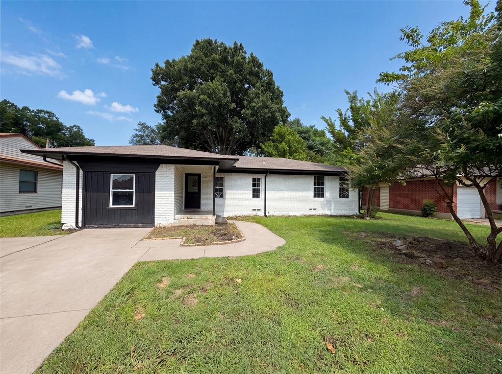 321 S 4th St is a 1-story Wylie single- home built in 1966. The kitchen anchors an open-concept layout with white cabinetry, quartz countertops, a tile backsplash, a stainless steel range, and a center island that adds prep space and casual seating, all set beneath a tray ceiling with recessed lighting. The adjoining living area carries the same flooring and a ceiling fan, creating a connected space for everyday gatherings. Four bedrooms provide flexible space for sleeping or work, served by two bathrooms, one with a single vanity and a tub framed by tile, the other with a glass-enclosed walk-in shower for a streamlined routine. A backyard shaded by mature trees and bordered by perimeter fencing rounds out the exterior. Clean interior finishes complete this well-maintained residence with practical amenities throughout every room. This home has been virtually staged to illustrate its potential.. Home comes with a 100-Day Home Warranty and a 7-Day Home Test Drive to move in 7 days early