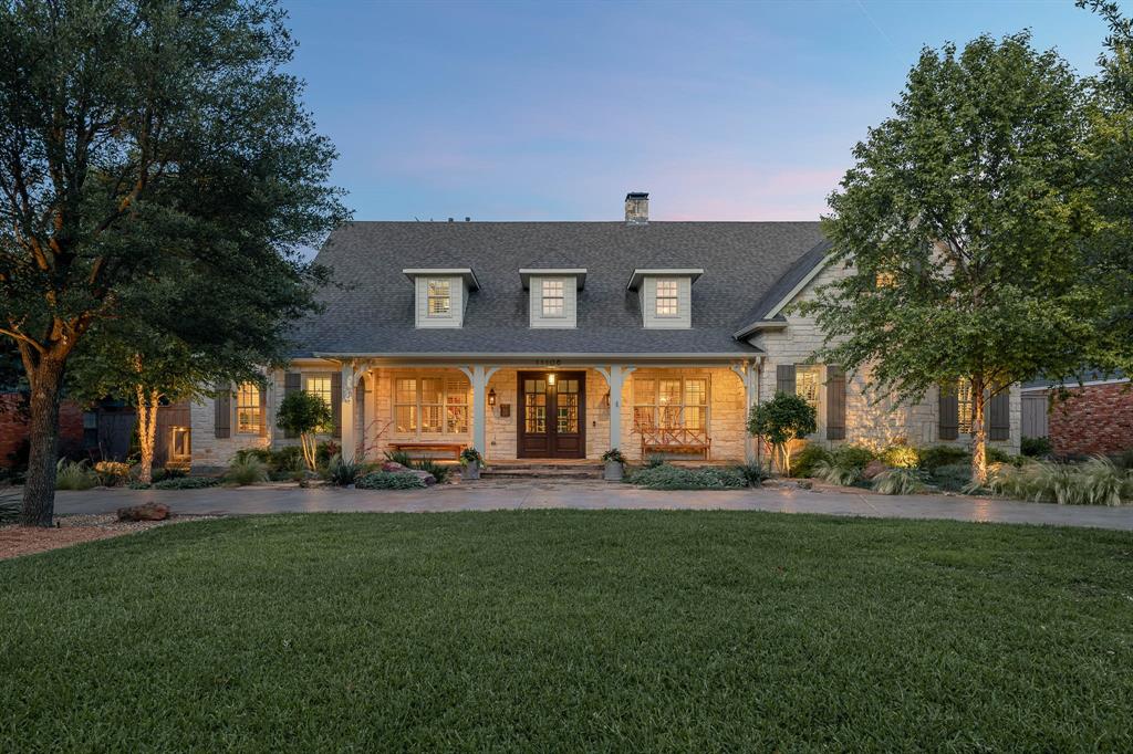 Live well & luxuriate in this gorgeous 4 bedroom 5.1 baths. Dallas dream home on lush landscaped grounds. Current owners completed an extensive renovation & expansion of the impeccable modern residence in 2019 incl circular drive; enlarging downstairs playroom w a full pool bath; mudroom & utility-craft room; renovating chef’s kitchen; adding rear sliding door; & installing new lighting, bookshelves & wall coverings throughout. Enjoy the outdoors on the relaxing front porch or covered rear patio w sitting area, TV, stone fireplace & outdoor grill for entertaining, & spacious patio around sparkling pool! Dramatic primary suite w soaring vaulted ceilings & wood beams is truly a private sanctuary. Impeccable interiors wrapped in high-end appointments incl Thibaut wall coverings, Ann Sacks tile, quartzite counters and Porcelanosa fixtures. Family room w stone fireplace, multiple living areas, study, large secondary bedrooms & gracious formals.  A turnkey gem in a premier neighborhood!
