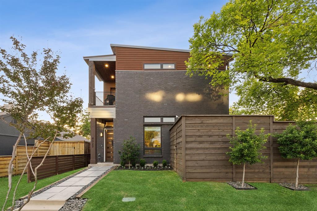 Built in 2016 with exceptional attention to detail, this home delivers modern design and serious livability in the heart of Old East Dallas. Step inside to 11-foot ceilings, museum-finish level 4 smooth walls, 8-foot solid-core doors, and hardwood floors throughout. A double sided floor-to-ceiling fireplace anchors the living and dining room, creating an open layout that's perfect for hosting and entertaining. The chef's kitchen features quartz countertops, an oversized island, Jenn-Air stainless appliances, custom cabinetry, and a built-in wine fridge. All three bedrooms are upstairs with their own en-suite bathrooms. The primary suite includes a private balcony with Dallas skyline views, soaking tub, oversized multi-head shower with built-in bench, dual vanities, and a massive walk-in closet. The multiple outdoor spaces highlight the home, with a decked and covered side patio, a landscaped courtyard, and a tucked away balcony off the primary. Downstairs you will also find a light-filled office that satisfies all work from home needs, and opens up to the patio as well as the garage. Other notable items include: surround sound speakers inside and out, custom window treatments, wired security system, spray foam insulation, and 2x6 walls instead of 2x4 which allows for additional insulation.