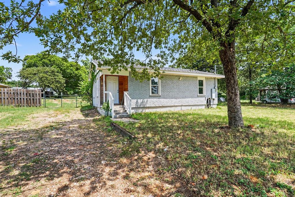 Opportunity awaits on this charming home situated on nearly 0.4 acres in South Fort Worth and located within Mansfield ISD. Originally configured as a 3-bedroom, 1-bath home, the current layout has been reconfigured to offer 2 spacious bedrooms, each with walk-in closets, plus a large hallway storage room and 1 full bathroom.
Major updates have already been completed, including a new roof (2025), HVAC system (2025), foundation repairs (2025), complete electrical rewiring with new panel (2025), fresh interior and exterior paint (2025), brand-new laminate flooring throughout, replacement windows (2021), water heater (2021), and updated PVC plumbing. The home also features a spacious laundry area, beautiful front yard, and a large backyard with plenty of room to enjoy.
The property is currently in the final stages of renovation and offers an excellent opportunity for investors, flippers, or buyers looking to add their own finishing touches. Kitchen renovation remains incomplete; cabinets have been purchased and are included but have not yet been installed. Dishwasher and microwave are also available but not installed. The bathroom requires additional finishing work as well.
Enjoy a quiet, country-like setting while remaining conveniently close to I-35W, I-20, Hwy 287, and FM 1187. Priced to sell and offered by a motivated seller, this property presents tremendous value and potential for the right buyer. Don't miss this chance to complete the vision and make it your own.