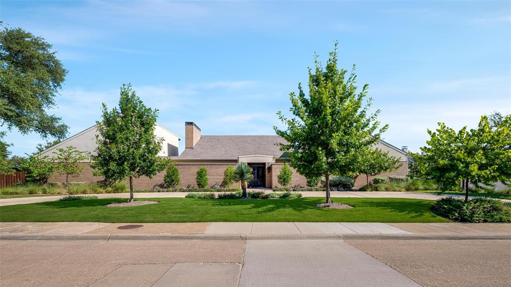 Sleek and sophisticated yet warm and inviting, this one-story home was completed in 2021. Although it was built to replicate the original home that was on the property, no portion of the old home was retained. The seamless design and thoughtful amenities add tremendous value. Iron gates contribute a sense of privacy as you enter the peaceful, low maintenance front courtyard, highlighted by a fountain and landscape lighting. This residence boasts impressive indoor and outdoor entertaining spaces, enhanced by Control4 smart home systems for superior sound and lighting control. With fiber optic wiring and a generator, the home offers modern convenience and reliability. There are four bedrooms, three full bathrooms, and one half bathroom, all arranged within an open floor plan featuring high ceilings. Custom cabinetry provides ample storage throughout the house, including a butler’s pantry and a wet bar for added functionality. The gourmet kitchen is equipped with premium appliances ideal for culinary enthusiasts. The spacious primary bedroom includes motorized shades and direct access to the pool and hot tub area, while the primary bathroom features a triple shower with waterfall and steam options, a Vibracoustic tub, heated floors, and a heated towel rack for luxurious comfort. The split bedroom layout offers flexibility; notably, one bedroom comes equipped with Dolby surround sound and cork wallpaper, making it perfect for use as a media room. The half-acre lot showcases an expansive backyard with a pool, hot tub, firepit, exotic hardwood deck, and a motorized pergola-covered grill area—ideal for outdoor gatherings. A pristine attached three-car garage offers substantial attic storage above to meet all organizational needs or potential for future additions.