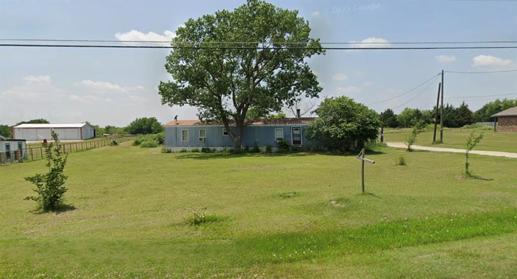 Check out this beautiful 1.55 acre lot is located in Palmer, Texas. This property offers county living with city convenience. City of Palmer utilities are on site and ready to use. Spectrum Internet available.  Value is in the land, as the mobile will need a full renovation or replaced with another mobile (2019 or newer). A brick and mortar build is another great option. Bring your creativity!