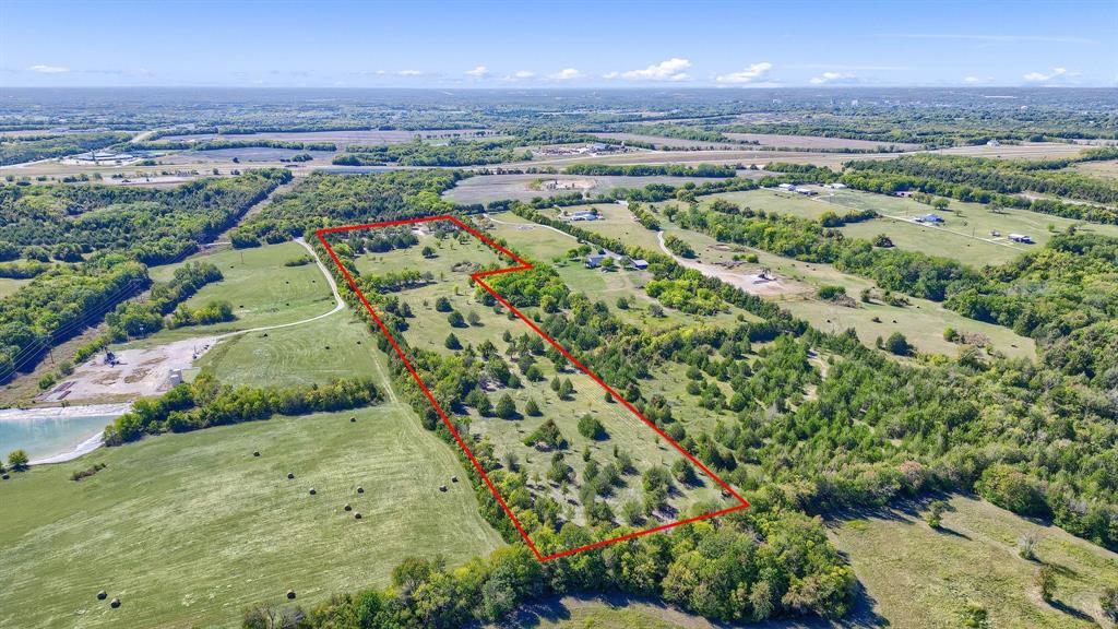 Beautiful rolling acreage with trees.  Fenced.  Property could be subdivided.  It has adequate road frontage.  Beautiful building site on hilll, and wildlife roaming the property.  A tranquil escape.  Approximately 5 minutes from the Town Center and minutes from Hwy 82.  Sign on property.  Call Broker Bay for showing instructions.  Seller will consider seller financing with agreed to terms.