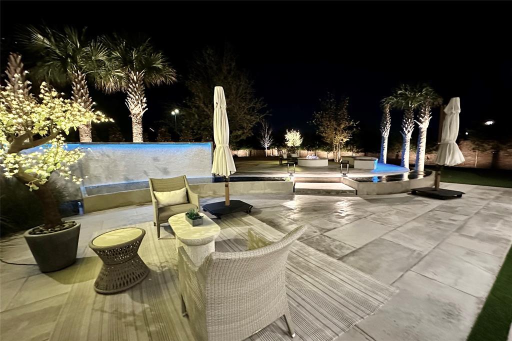UNBELIEVABLE PRICE in the ULTRA-LUXURY Homestead of Gated Newman Village. Custom,Quality w-Warm Modern Design on .474Acre. $400K+Landscaping for Privacy & Natural Aesthetics, Hardscaping w-Water Features, FirePit & Front Motorcourt + $100K+AV-Electronics & Blinds. Chef's Open Kitchen w-small PrepArea & 2nd ServingArea off Refrigerated WalkIn Wine Storage & DiningRm. WALL OF WINDOWS inviting Outdoors In in Living w-GasFP. Downstairs Secluded PrimarySuite w-SoakingTub, DualPersonShower, DualVanities, WaterCloset & 2 Large WalkInClosets. Downstairs Guest Suite, Study, Dual DropZones, Utility w-Addl UnderCabinet Refrigeration & Walk-InPantry. Upstairs Living w-Bar & MediaTheater. 3 Large Upstairs Beds w-En-SuiteBaths, 2nd HalfBath & Large Exercise Bonus Rm. Outside Covered Living w-GasLogFP & TV, Dining & Kitchen w-Built-InGrill, IceMaker & BevFrig. PRIVATE Park-Like Backyard w-Stone Patios, 4HolePuttingGreen & HUGE GrassyYard. Plenty of Space to Add a HUGE Pool, SportCourt, and then some!