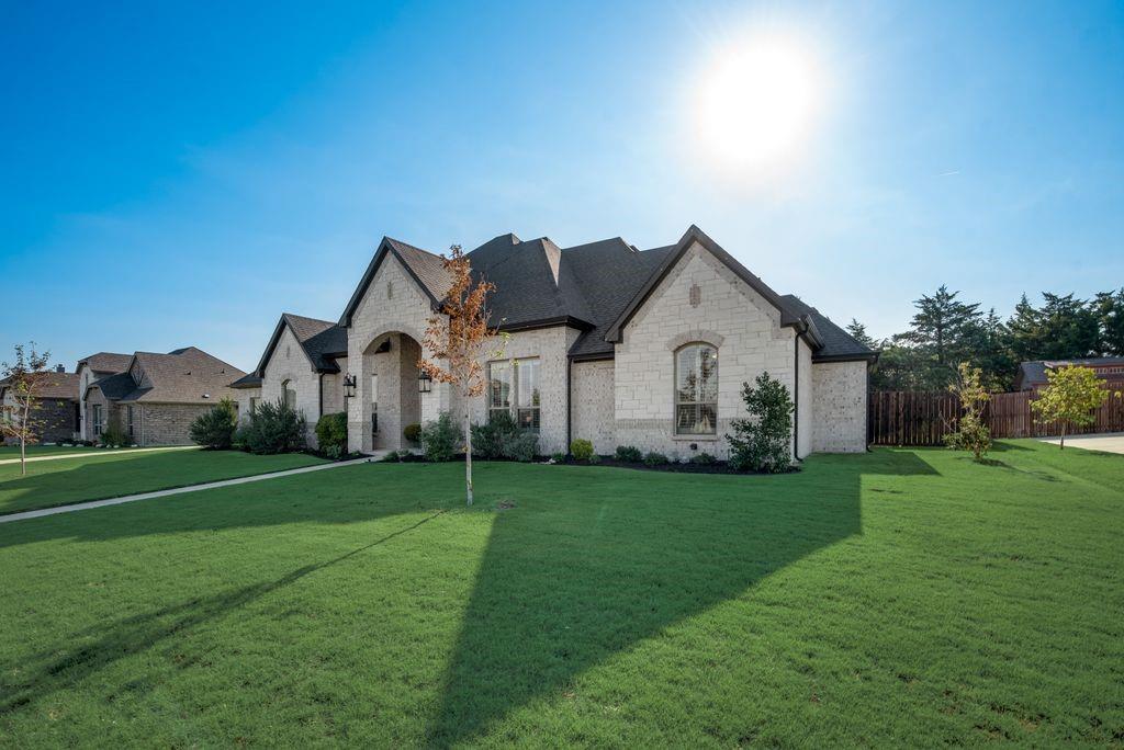 Beautiful CUSTOM built home in the outstanding neighborhood of Bryson Manor in Ovilla. This Olson Custom home is loaded with all the amenities including four bedrooms & three full baths, large living room with fireplace & hand scraped hardwood floors, game room with access to the large patio & a bathroom, & the incredible oversized kitchen for entertaining the family reunions. The gourmet kitchen has granite countertops, large island for food prep, walk-in pantry, breakfast bar, but the stainless steel appliances cover all the bases with built ins like the double oven, microwave, dishwasher, & a gas stove top for cooking up the delicacies - stainless steel refrigerator too. Retire to the master suite when exhausted & be refreshed in the large Hollywood tub or use the walk in shower. Other features are large closets, plantation shutters, decorative lighting, 3-car garage, sprinkler system, tankless water heater and so much more. Come home to OVILLA!