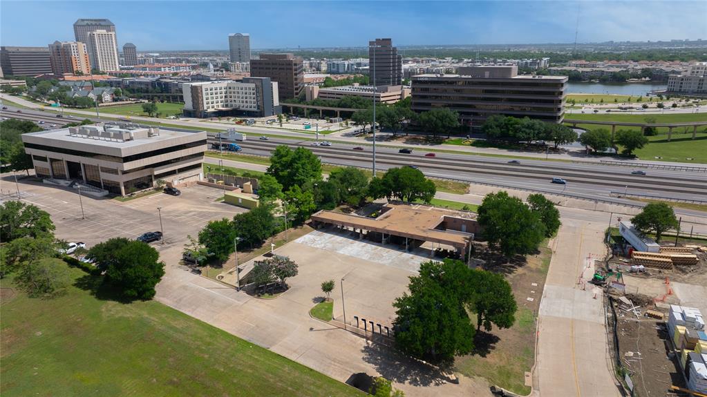 1.22 acres. Great location on 114 in Las Colinas. Was a Chase drive-through. Deed restricted now and can not be a bank. 
Survey is in documents.
