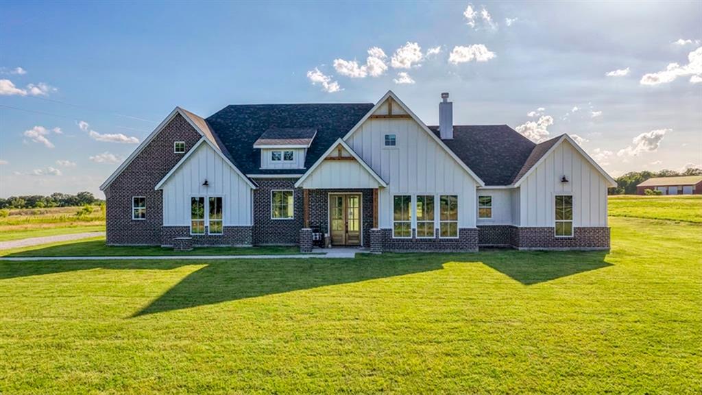 The Rebekah Plan, where spectacular design meets charming character! Spanning 2,675 square feet, Inside, every detail speaks to comfort and versatility 4 spacious beds, 4 full baths, a convenient half bath, & dedicated office or flex. The great room features a vaulted shiplap ceiling, a cozy wood-burning fireplace, & stunning views of the rear porch. The dining room is open to the great room with seamless access to outdoor living, perfect for entertaining or family meals with a view. The kitchen is a chef’s dream, featuring a large center island, custom cabinetry with under-cabinet lighting, a huge pantry, & all the modern amenities one would desire. The owner’s suite offers a luxurious retreat with vaulted ceilings, & a generous walk-in closet. The ensuite bath elevates relaxation with dual vanities featuring lit mirrors, a separate tub, & a spacious walk-in shower. Two more bedrooms each boast their own ensuite, ensuring privacy & comfort for family or guests. This home includes wiring for security cameras & a smart doorbell for peace of mind, & wall-mounted TV outlets for easy entertaining, under-cabinet lighting, lit mirrors in the master bath, & high-end finishes such as Delta faucets, & spray-foam insulation for efficiency. Outdoor Living at Its Best! The back porch is an entertainer’s paradise, already plumbed for an outdoor kitchen! This porch has plenty of space to savor sunsets, share meals, or simply unwind. Nestled in historic Granbury, Offering rural tranquility with modern conveniences: no city taxes, no water bill, & no HOA. A short drive to downtown Granbury Square provides shopping, dining, culture, & you’re about 15 min from Lake Granbury Marina for boating, fishing, and lakeside recreation.  Txt keyword ZHB11 to 88000 for Virtual Tour & builder details.