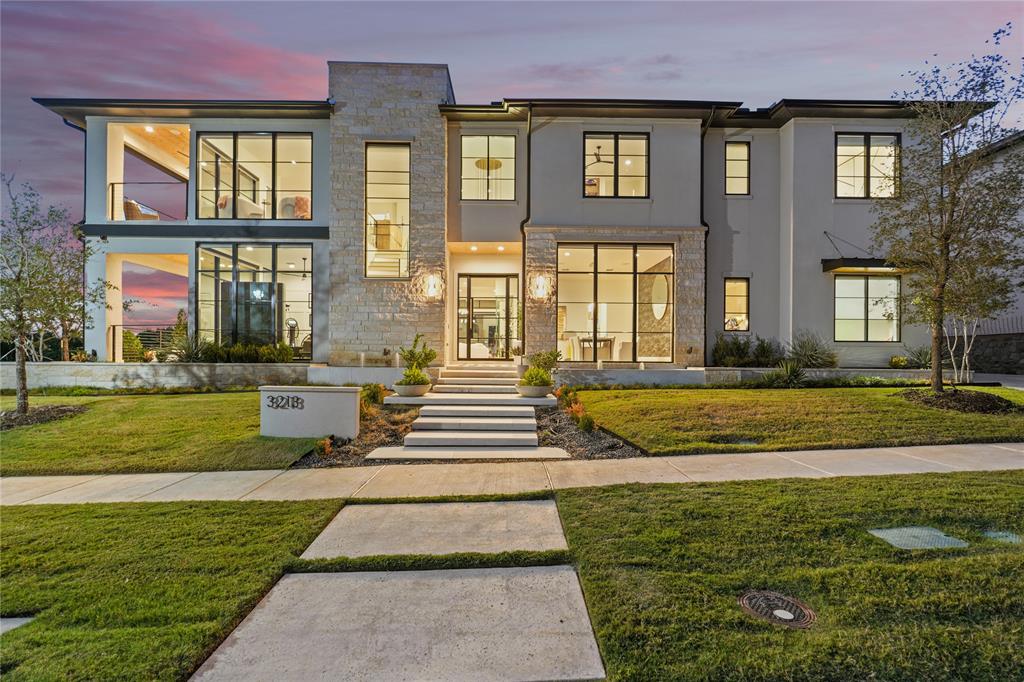 Ron Davis Custom Homes unveils this breathtaking 2-story modern masterpiece in the prestigious, gated Hills of Kingswood. With its striking stucco-and-stone exterior, soaring glass entry, and refined transitional design, this residence offers the perfect blend of luxury, comfort, and architectural sophistication.

Inside, discover an expansive open-concept floor plan highlighted by a dramatic 2-story foyer, elegant ceiling treatments, and walls of glass that bathe the home in natural light. The gourmet kitchen is designed to impress with professional appliances, marble and quartz surfaces, custom cabinetry, a large island, butler’s pantry, and wine display — opening seamlessly into the family room and dining spaces.

Enjoy resort-style indoor-outdoor living with expansive sliding doors leading to a covered patio featuring an outdoor kitchen, fireplace, and pool—a true entertainer’s dream. The primary retreat on the first floor offers a spa-inspired bath, oversized shower, soaking tub, and custom designer closet, while a private guest suite provides comfort for visitors. Upstairs, you’ll find a spacious game room with balcony views, a media room, homework center, and ensuite bedrooms with walk-in closets.

Every detail has been carefully curated — from wide-plank hardwood floors and elegant finishes to smart energy-saving features. With a 4-car garage and proximity to The Star, Legacy West, Stonebriar Country Club, and top Frisco schools, this home delivers the ultimate in modern luxury living.

Schedule your tour today!