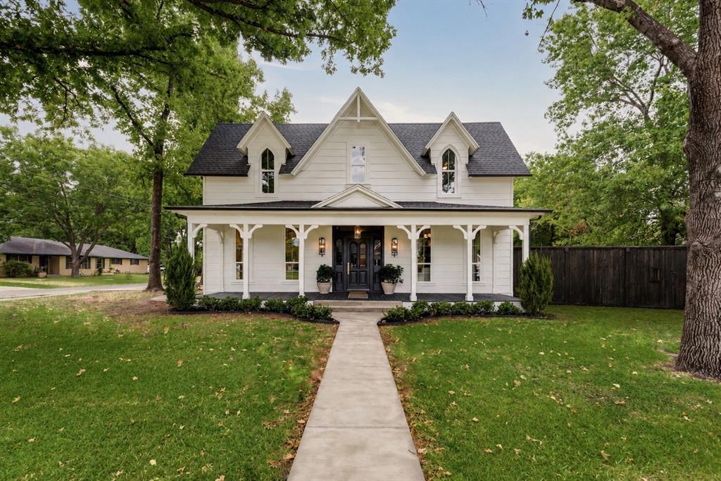 Come see this beautifully restored historic home in the heart of Pilot Point. Originally built over 120 years ago, this iconic Victorian sits on a large corner lot shaded by beautiful mature oak trees and blends timeless character with modern functionality. Thoughtfully restored just a few years ago, nearly every major system in the home was updated including electrical, plumbing, HVAC, insulation, windows, and more — while carefully preserving the original charm and craftsmanship throughout. From the original hardwood floors and grand staircase to the detailed banister work, the character of this home is truly unmatched. The redesigned floorplan offers an open and inviting layout with 3 bedrooms, 2.5 bathrooms, a study, and a mudroom. The bright kitchen features quartzite countertops and a commercial-grade gas range, while the primary bath showcases a luxurious wet room with the tub and shower combined into one stunning space. The outdoor space is just as inviting with an 8-foot wood privacy fence, covered back patio, and multiple concrete entertaining spaces that create the perfect setting for relaxing or hosting guests outdoors. A truly one-of-a-kind property that must be experienced in person to fully appreciate.