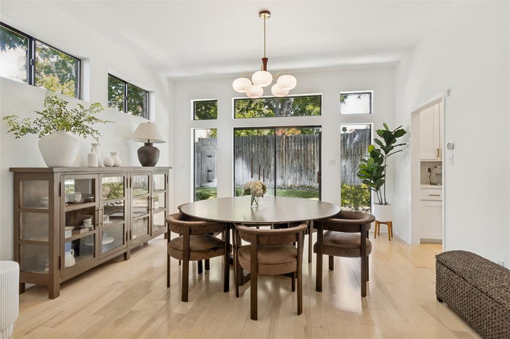 Step into a residence that perfectly balances modern sophistication with everyday comfort at 5633 Ellsworth Avenue. This home has been thoughtfully reimagined from top to bottom, boasting a complete renovation that leaves no detail overlooked. From the moment you enter, the fresh flooring and designer finishes set a tone of understated luxury that carries through every room.

The heart of the home is a chef-inspired kitchen outfitted with sleek stainless steel appliances and a charming breakfast banquet for casual mornings. For more formal gatherings, the dedicated dining room flows seamlessly into the first of two spacious living areas, anchored by a beautiful fireplace that serves as a striking focal point. The renovated half bathroom showcases designer wallpaper and provides convenience & charm.

Upstairs, the layout features two generous bedrooms and two stylishly updated bathrooms. The primary suite is a true retreat, boasting a spa-like bathroom complete with a deep soaking tub and a separate, oversized shower. You'll find an incredible amount of space to stay organized in this home, between the oversized walk-in closets and the thoughtful storage solutions tucked throughout the home.

Step outside to find a completely PRIVATE backyard oasis designed for relaxation without the work. The large outdoor space is finished with premium evergreen turf, offering a lush, green aesthetic year-round with little maintenance required. A rare two-car garage provides convenience and extra storage in this highly sought-after area.

Situated in a prime location near Greenville Avenue and zoned to Mockingbird Elementary, this home puts you just moments away from local coffee shops and popular restaurants. With its impeccable finishes and vibrant surroundings, this is a property that truly must be seen in person to be fully appreciated.