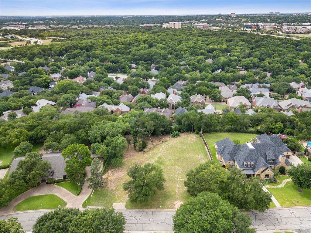Rare 1.036-acre Overton West homesite offering an elevated view setting, mature trees, and a prepped pad site for a future custom estate. This is a unique opportunity to build in one of Fort Worth’s most desirable neighborhoods with much of the early planning already in place. Seller has invested in pad-site preparation and completed custom architectural plans, which may be included with an acceptable offer. Conceptual renderings showcase the potential for a luxury residence designed to take advantage of the lot’s scale, privacy, and view-oriented setting. Buyer to verify all plans, permits, zoning, restrictions, utilities, buildability, schools, measurements, and intended use.