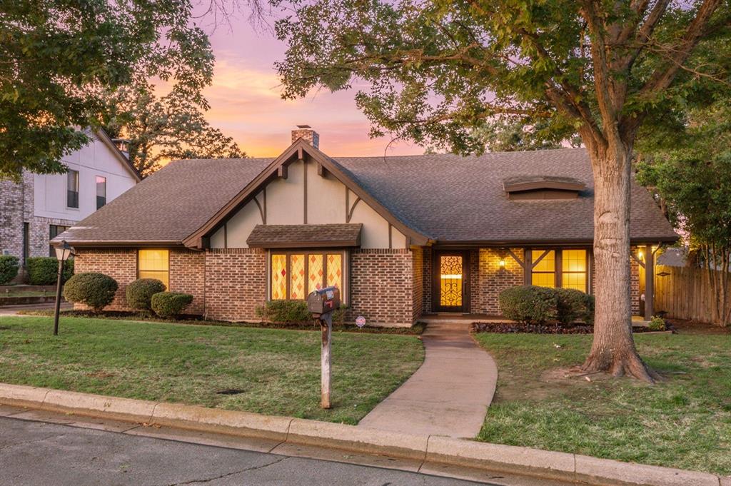 Designed for the way you truly live, this beautifully updated 4-bedroom, 2.5-bath home offers the perfect blend of comfort, flexibility, and convenience. The inviting main living area serves as the heart of the home, featuring a cozy fireplace framed by custom built-in cabinetry for both style and storage. The updated kitchen is thoughtfully designed with custom cabinetry, quartz countertops, an eat-in breakfast bar, new range, and a spacious breakfast room filled with natural light from oversized windows overlooking the backyard. Whether enjoying a quiet morning coffee or hosting weekend gatherings, this space feels warm and welcoming. The relaxing primary suite offers a sitting area, and ensuite with two private prep areas and vanities, along with fine finishes found in much more expensive homes, including Carrera marble, granite, an updated deep soaker tub and luxurious shower - all designed for unwinding after a long day. Updates don't end there, but can be found in each bathroom, as well as a neutral palette throughout the home,  With four generously sized bedrooms, and a versatile floor plan that provides a flex space perfect for a second living area, formal dining room, playroom, or home office, there’s room for guests, work-from-home needs, or multi-generational living. Step outside to a large patio ideal for outdoor dining, grilling, and entertaining, while the rear-entry garage adds both privacy and curb appeal. The Texas sized garage offers plenty of room for large cars, workbenches, outdoor tools and much more! Ideally located within walking distance to the local elementary school and conveniently situated between Dallas and Fort Worth, this home places you minutes from Texas Live!, AT&T Stadium, Globe Life Field, Six Flags, and Texas Rangers Golf Club. Enjoy quick access to dining, entertainment, and year-round attractions while still coming home to your own private retreat.  See it TODAY or see it SOLD!
