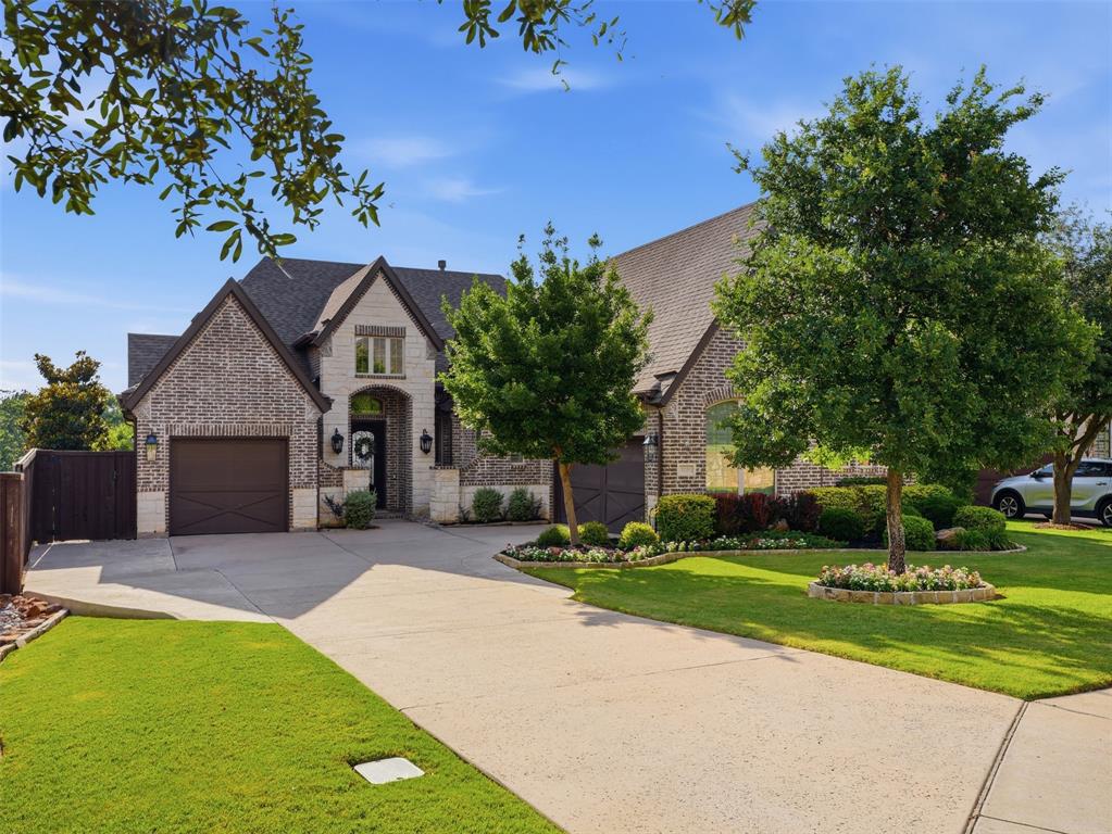 The moment you walk through the door, you will be impressed. Positioned on one of the most sought-after lots in Grapevine, this home backs directly to Corps of Engineer property, giving you rare privacy, wide open green space, and access to nearby trails you simply cannot replicate in a traditional neighborhood setting. With no backyard neighbors and a natural buffer behind you, the sense of space and serenity is immediate.

The backyard is a true resort-style oasis, anchored by a stunning custom Trident pool with an in-floor cleaning system, water features, and dramatic fire bowls. A custom cabana with a motorized screen and Big Ass Fan makes this the ultimate space to entertain or unwind while watching those iconic Texas sunsets.

Inside, the unique and functional floor plan impresses immediately. Oversized windows along the back of the home frame the breathtaking backyard from the moment you enter the front door, filling every room with natural light and seamless indoor-outdoor living. Custom touches are found throughout: hardwood floors, upgraded granite countertops, designer lighting, remote-controlled window coverings, and plantation shutters create a sophisticated yet livable interior. A walkout from the first floor puts you steps away from the pool at all times.

Located just minutes from Downtown Grapevine, Lake Grapevine, and the Gaylord Texan, this home delivers on lifestyle just as much as it delivers on luxury. Homes on lots like this do not come available often. Do not miss your opportunity.