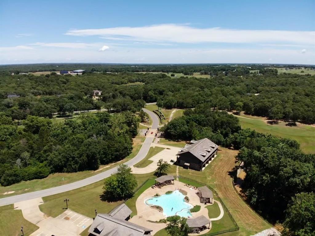Welcome to Rock Creek! Rock Creek is a private, gated master-planned community nestled on the shores of Lake Texoma. This is a beautiful lot with endless opportunities for your future home placement. Enjoy an exclusive lifestyle with amenities that cater to every interest, including a Jack-Nicklaus designed golf course complete with a clubhouse, restaurant, and pro-shop. The community also features boat-slips, a gas dock, fitness center, scenic trails, swimming pool, and tennis courts. Experience luxury and leisure in this beautiful community right on the lake!