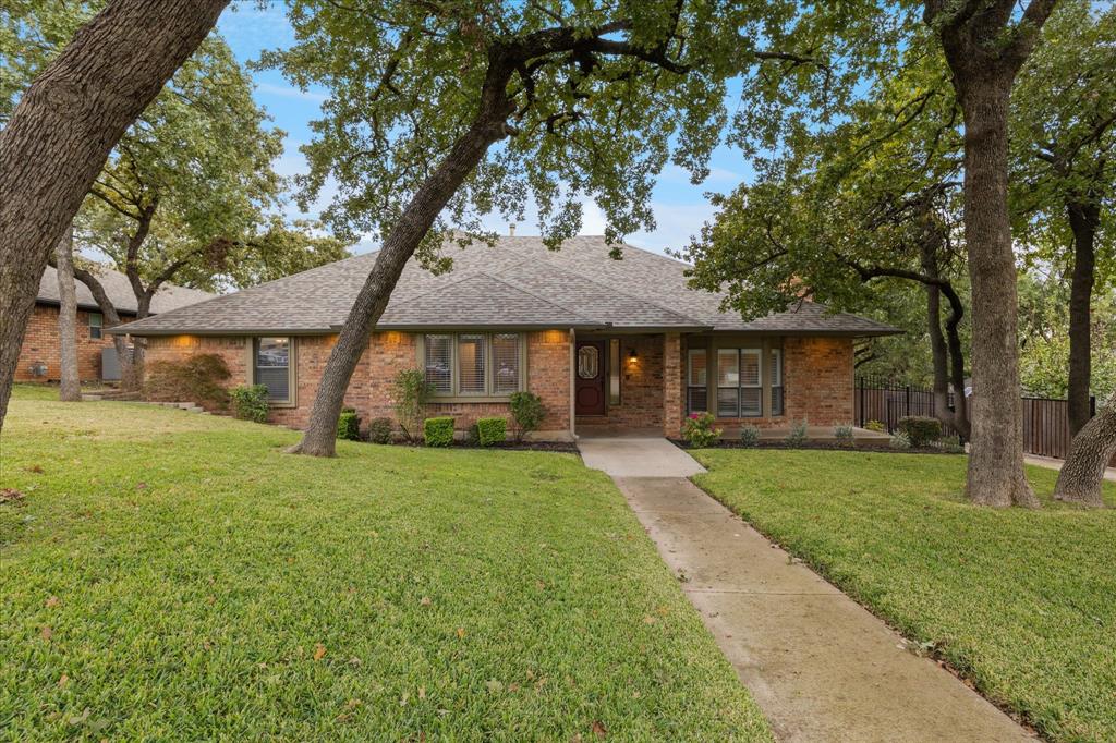 Built in 1978, this well-maintained home offers a functional and inviting layout with a spacious living area, dedicated dining space, and an eat-in kitchen featuring newer stainless steel appliances. The private primary suite includes an ensuite bath, while the secondary bedrooms provide flexibility for guests, family, or a home office. An oversized 2-car attached garage provides ample space for parking and storage. Step outside to a large backyard perfect for entertaining, relaxing, or creating your ideal outdoor retreat. Located in the highly sought-after Parkway North subdivision within Arlington ISD, the home also offers convenient access to schools, shopping, dining, and major highways, making it an exceptional blend of comfort and convenience.