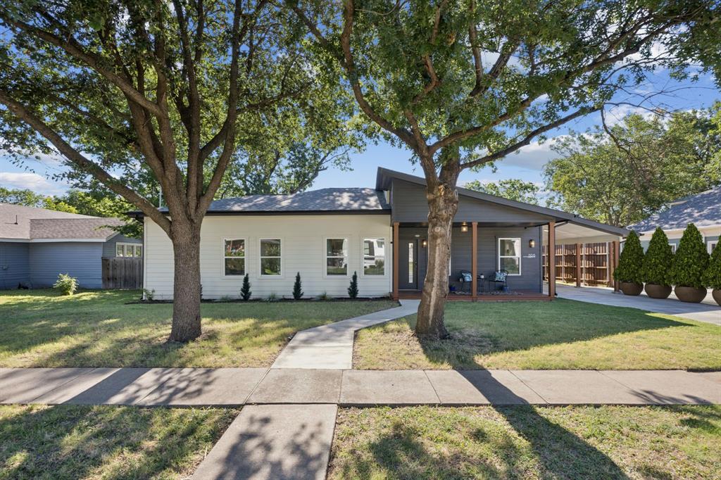 SPECIAL OPPORTUNITY minutes from the incredible Historic Downtown McKinney! Fantastic modern home on huge lot with plenty of space to build a second structure. Completed in 2023, this impressive home boasts striking curb appeal with modern paint colors, covered front porch, two private back porches, a HUGE fenced pool sized backyard and all the benefits of living close to Downtown McKinney without all the historic district restrictions! Step up to the modern split light front door and enjoy the charming front porch- perfect for chatting with neighbors or just enjoying the outdoors. Step inside and be ready to be impressed! This light and bright open floorplan boasts 9 foot ceilings vaulted to 14 feet in the living room, fantastic flow and abundant natural light from multiple windows. Features of the home include easy care LVP flooring throughout (except baths), modern ceiling fans with remote control in most rooms and quartz in kitchen and baths. The spacious living room is open to the kitchen and dining making it perfect for entertaining. The kitchen is a dream with quartz countertops, massive island, enormous walk in pantry and stacked cabinets with glass to showcase your treasures with soft close cabinetry. Just off the living room is a private office, perfect  for dedicated  work from home space but not too far from family activity. The spacious primary has backyard access, spa like en suite bath and massive walk in closet. The split secondary bedrooms are also nice sized! The home has a huge fenced backyard that is perfect for pets and kids to run and play. Two sheds for great storage. Note from seller: the roof was designed for possible future solar panels with large area facing south.  Convenient to all that Historic Downtown McKinney has to offer including shopping and dining, this location can't be beat. Don't miss this one! Please note that this is an active AIRBNB. Do not approach property with out an approved appointment.