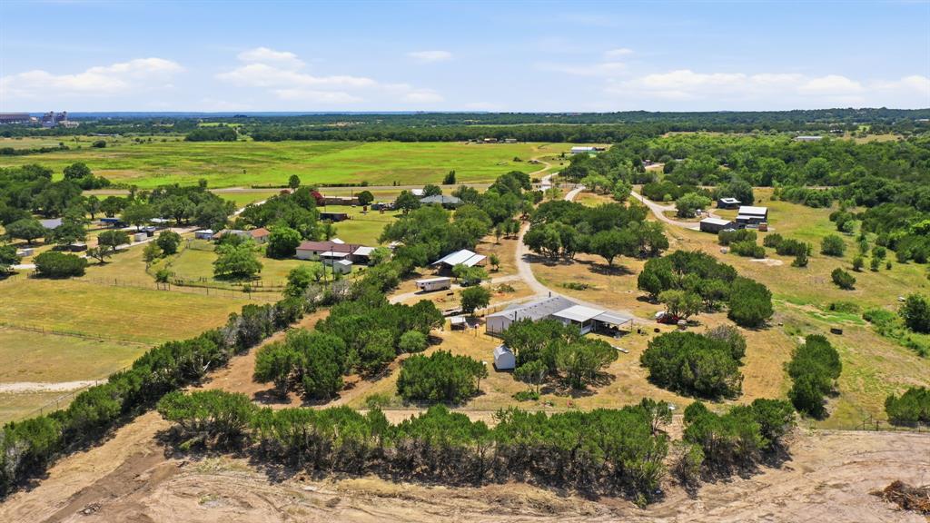 Escape to the peace and quiet of the country with this well-maintained 3 bedroom, 2 bathroom mobile home set on 5+ sprawling acres. Ideal for those seeking privacy, space, and room to roam without sacrificing comfort, this property offers the best of Texas country living.
The home is in good condition and move-in ready, with a split floor plan providing a private primary suite with an en-suite bath, while two additional bedrooms share a second full bathroom great for families, guests, or a home office setup. The open living and kitchen areas offer plenty of room to entertain or simply relax after a long day.
With 5+ acres to enjoy, the possibilities are endless bring your animals, start a garden, park your trucks and trailers, or simply take in the wide-open Texas sky. Whether you’re looking for a starter home, an investment opportunity, or a peaceful retreat with acreage, this property checks all the boxes.
Don’t miss your chance to own a piece of country living at a great value. Schedule your showing today!