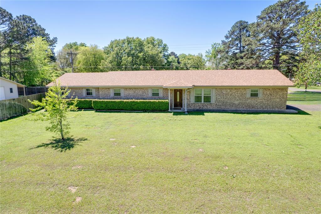 ** MOTIVATED SELLER - BRING ALL OFFERS!! ** Spacious, Immaculate Home on Corner Lot with Shop - Every inch of this beautifully maintained 4-bedroom, 3-bathroom home is exceptionally clean and move-in ready. Situated on a large corner lot, the property features a privacy fence along with an impressive 28x28 shop complete with an attached equipment shed—perfect for storage, hobbies, or projects. Designed with entertaining in mind, the home offers an open living and dining area, as well as a spacious second living room, providing plenty of room for gatherings or relaxing. The kitchen is both functional and inviting, featuring quality wood cabinetry and convenient pull-out shelving in most lower cabinets. Just off the kitchen, you’ll find a large laundry or mud room for added convenience. The bedroom layout offers privacy and flexibility, with one bedroom featuring its own private bath. The primary suite includes a large walk-in closet and a beautifully remodeled bathroom (2019). Recent updates add even more value, new paint (2023) including a new water heater (2022), roof and gutters on both the home and shop (June 2023), and energy-efficient Woodbridge triple-pane windows installed in 2018 for improved comfort and noise reduction. Also, a new oven and microwave were added to the kitchen appliances. With generous living space inside and out, this home is perfect for families of all sizes. Don’t miss your chance to see this truly exceptional property in person!