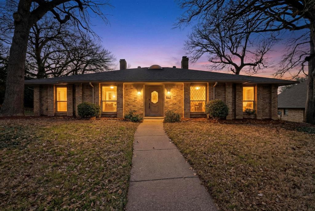 Designed for the way you actually live, this 4-bedroom, 3-bath home blends comfort, convenience, and everyday enjoyment. The main living area is the heart of the home, with built-in cabinets for storage next to the fireplace. The sitting area just off the kitchen features large windows that look out over the pool—bringing in natural light and creating the perfect backdrop for relaxing evenings or weekend gatherings. Step outside and you’ll find a spacious deck overlooking the pool. Whether it’s morning coffee outside or poolside get-togethers, this backyard was made to be used and enjoyed. Inside, the thoughtful layout offers room for everyone, along with ample closet space throughout to keep things organized and functional. There’s flexibility for guests, a home office, or multi-generational living. Location adds to the lifestyle. You’re within walking distance to the local elementary school and perfectly positioned between Dallas and Fort Worth, making commuting and entertainment easy. Just a short drive puts you at Texas Live!, AT&T Stadium, Globe Life Field, Six Flags, and the Texas Rangers Golf Club. Don't miss your chance to see this home that gives you quick access to dining, sports, and year-round fun while still coming home to your own private retreat.