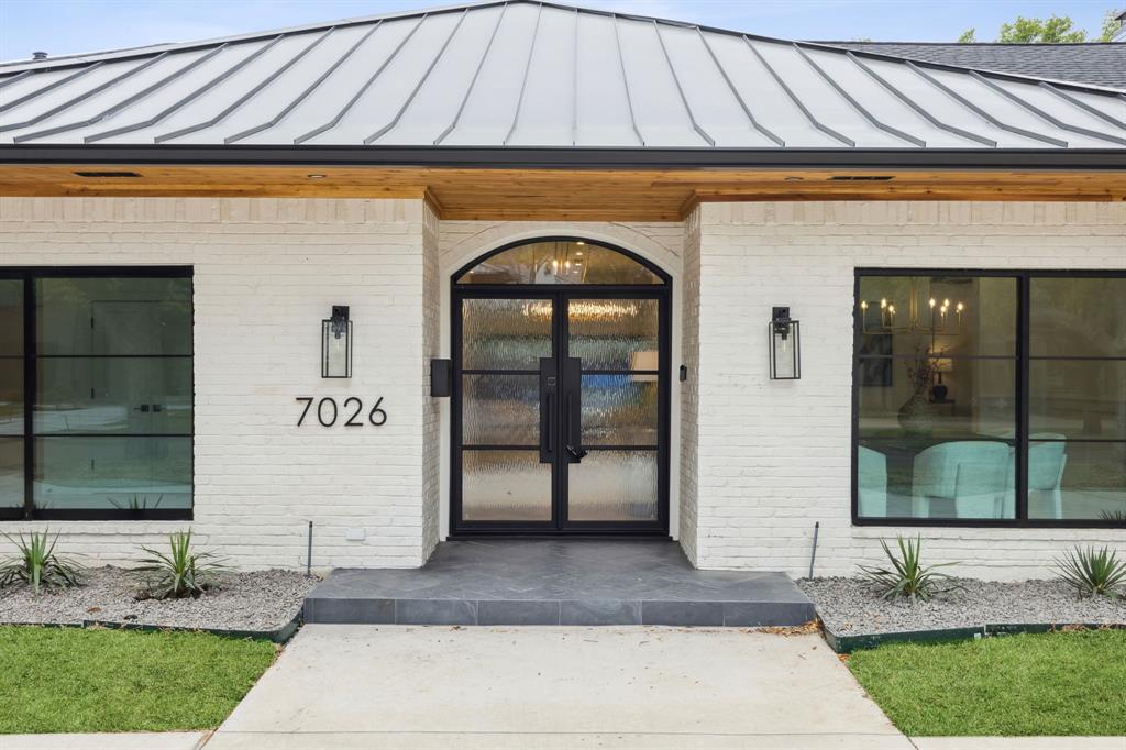 Exquisite 4-bed, 5 bath estate resting on over a half-acre lot on a beautiful tree-lined street in highly desired Windsor Park subdivision of Preston Hollow. Fully renovated and reimagined, this home features immaculate details with a no-expense spared remodel displaying a beautiful blend of large indoor and outdoor entertainment, family, and flex spaces. Standout features include iron front and exterior doors, 10-foot vaulted ceilings, stunning white oak floors, built-ins, and designer hardware and lighting throughout. Owner’s retreat with fireplace and true spa bath features a sauna, towel warmer, soaking tub, walk-in shower, and custom closet with make-up vanity. Chef’s open concept kitchen is equipped with professional-grade Zline appliances, waterfall quartz island, 60” fridge, and two dishwashers. Abundant windows throughout allows for lots of natural light and incredible sweeping views of the expansive backyard oasis with pool, fire pit, pergola, cabana and lots of grassy areas.