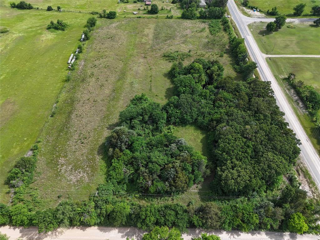 Discover the perfect blend of peaceful country living and convenient access with this stunning 8.5-acre property in Ravenna, TX. Featuring both county road and Highway 78 frontage, this beautiful tract offers excellent accessibility while maintaining a private, rural feel. Located just minutes from the Oklahoma border and only 15 minutes from town, you’ll enjoy the tranquility of wide-open spaces without sacrificing nearby amenities. Whether you’re looking to build your dream home, establish a small farm, or create a weekend retreat, this versatile acreage is ready to bring your vision to life.
With plenty of room to spread out, the property offers endless possibilities—bring your animals, start a garden, or simply enjoy the natural beauty and peaceful surroundings. Opportunities like this don’t come around often—secure your slice of Texas countryside today.