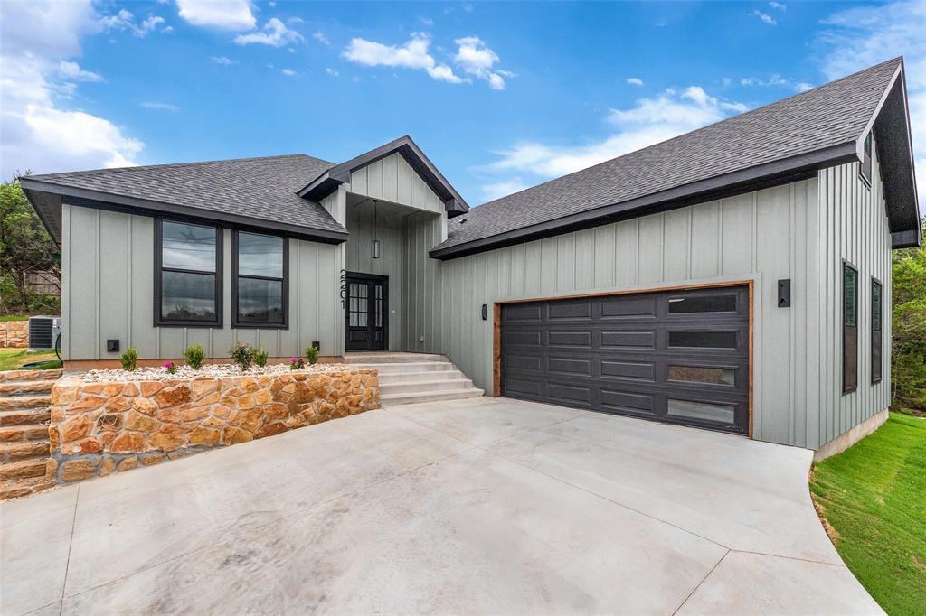 Welcome to this beautiful brand-new home in the highly desirable Canyon Creek community! A charming covered front porch welcomes you into a bright, open-concept floorplan designed for both comfort and functionality. The spacious living room features a cozy fireplace and flows seamlessly into the dining area and kitchen, creating the perfect space for entertaining or everyday living. The kitchen is thoughtfully designed with quartz countertops, a large peninsula, an electric range, built-in microwave, dishwasher, and a pantry with plenty of storage. The private primary suite offers a relaxing retreat with a large walk-in closet and an ensuite bath featuring dual quartz vanities and a glass-enclosed shower. Three additional bedrooms provide plenty of space for family, guests, or a home office. A secondary bathroom with quartz countertops and a convenient laundry room with direct access to the two-car garage add to the home's practical design. Step outside to enjoy the covered back patio overlooking a spacious backyard, perfect for outdoor dining, play, or relaxing evenings. Located in Canyon Creek, residents enjoy a guarded security gate, community clubhouse, swimming pool, fishing pier, tennis courts, multiple boat ramps, and access to Lake Granbury. Combining modern finishes, thoughtful design, and outstanding community amenities, this stunning new construction home is one you won't want to miss. Schedule your showing today!