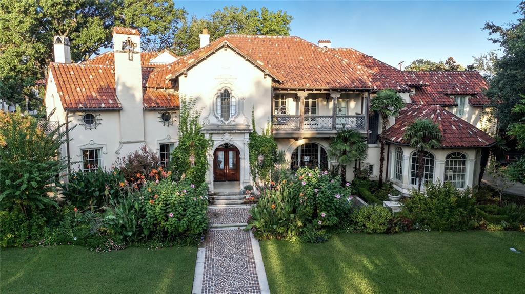 This is more than just a home – it’s THE address. Tucked within the prestigious Volk Estates and located in the highly sought-after Highland Park ISD, this .85-acre estate blends luxury, lifestyle, and livability like no other. Step outside to an entertainer’s dream backyard featuring:  Back house with full living quarters up and ensuite bathroom; Sparkling pool and outdoor fireplace; Fully equipped outdoor kitchen; Putting green, gravel run, and Generac generator; And room to add a tennis or pickleball court. Every inch of this estate has been thoughtfully curated by renowned architect Larry Boerder and constructed by premier builder George Lewis Custom Homes in 2005. With craftsmanship and design at its core, this home redefines elevated living and a circuitous floor plan for easy flow, and elevator ready closet. Inside, discover a layout designed for both grand entertaining and intimate living, including: spacious bedrooms, a serene primary suite with spa-like bath and dual walk-in closets; Multiple living areas bathed in natural light; Two first-floor offices, ideal for work-from-home living; Gourmet chef’s kitchen with marble island, custom cabinetry, breakfast nook, walk-in and butler’s pantries (including two sterling closets); Home theatre, gym, billiards room, and wine cellar. This is where luxury meets lifestyle—rarely does a home of this caliber, on this scale, in this location, come to market.
