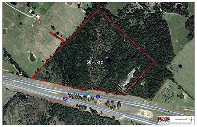 58+ acres of heavy timber only 31 miles from Dallas. Great getaway for four wheeling, camping, hunting, totally secluded and private. 1,950 feet frontage to Interstate 20! Ten miles from Buc-ee's Terrell. Just minutes from Canton and the Shops at Terrell mall.  Nice pond!