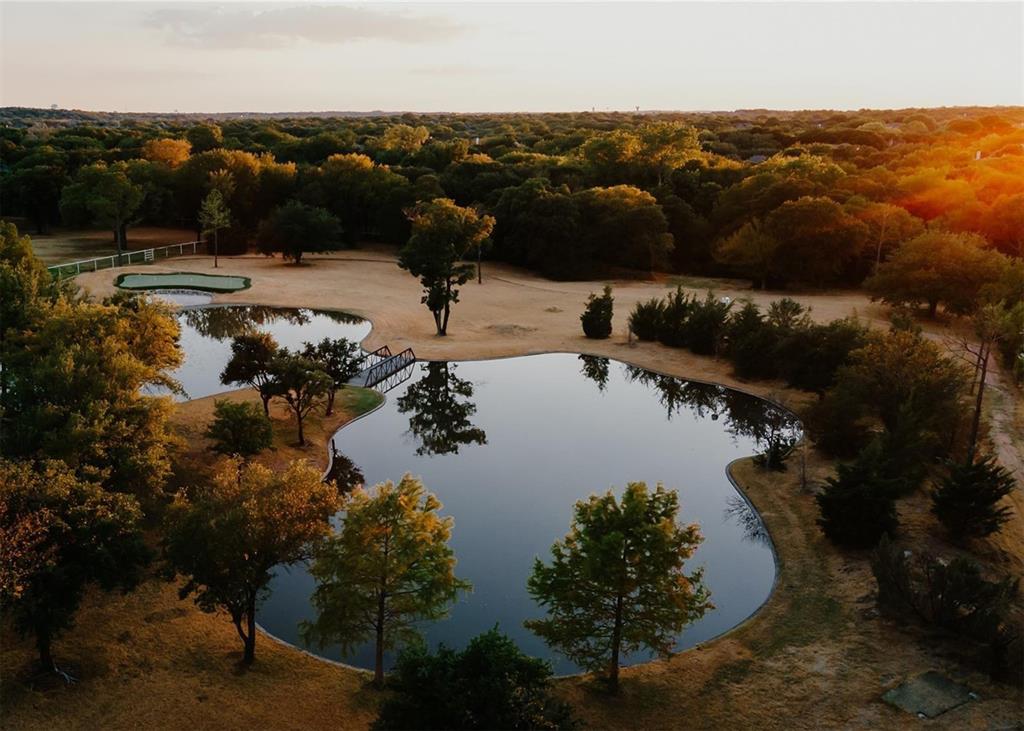 Build your Dream, Own History.  Welcome to Amazing Grace! This property offers almost 5 acres of privacy with true estate living.  Situated off of highly desired White Chapel Blvd. in Southlake, TX., Amazing Grace is packed with potential and opportunity.  Sitting on almost 5 acres, the property has plenty of room for recreational use, enough land for horses and comes with a chipping green with two private ponds providing picturesque sunsets.  The property also comes with city utilities, a private well and entry gate.  Amazing Grace is centrally located and holds quick access to 114, Southlake Town Square and is home to the Carroll Dragons.  This is your chance to own a piece of history in Southlake, TX. 710 South Whites Chapel is a blank slate for you to build your dream home and I look forward to you calling Amazing Grace your next home!  Call Today!