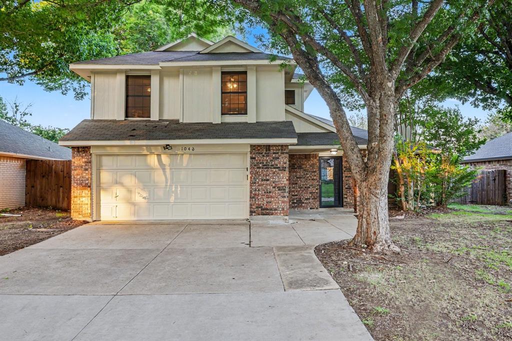 Beautiful 3-bedroom, 2.5-bath home features a functional floor plan with a first-floor primary suite and secondary bedrooms upstairs. Mature trees and established landscaping provide shade, privacy, and timeless neighborhood charm. Recent 2025-26 updates include luxury vinyl plank flooring, new carpet, fresh exterior paint, granite countertops. Major improvements have already been completed, including a professionally repaired foundation with a transferable lifetime warranty and sewer line repairs, offering added peace of mind. Enjoy an oversized driveway, a private backyard ideal for relaxing or entertaining, and a convenient location near shopping, dining, parks, Lewisville ISD schools, and the Highland Village DCTA station. Move-in ready with many of the big-ticket items already addressed, while still offering an opportunity for the next owner to add a few personal finishing touches and make it their own.