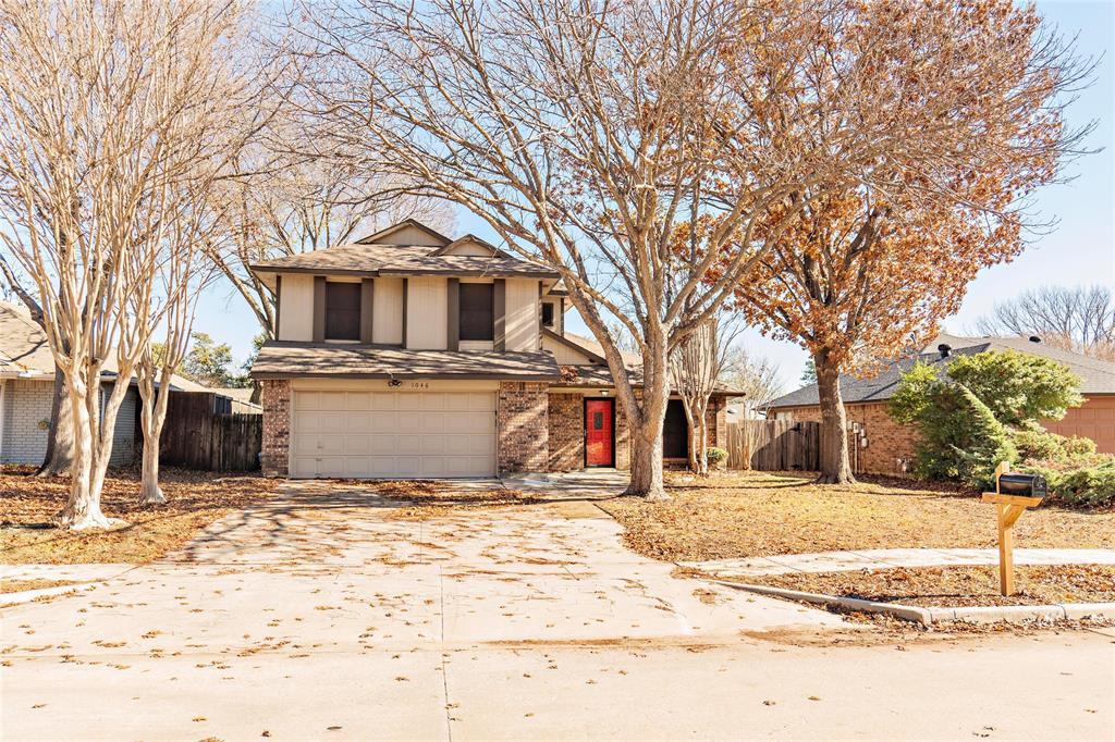 Welcome to 1046 Colony St in Flower Mound! This updated 3-bedroom, 2.5-bath home offers a functional floor plan with the primary suite conveniently located on the first floor and secondary bedrooms upstairs. Mature trees and established landscaping provide shade, privacy, and timeless neighborhood charm rarely found in newer construction. Recent 2026 improvements include luxury vinyl plank flooring, new carpet, fresh exterior paint, granite countertops, and stainless steel appliances. Major updates already completed include a professionally repaired foundation with transferable lifetime warranty and sewer line repairs, offering added peace of mind for future owners. The oversized driveway provides ample parking, while the private backyard creates a comfortable space for relaxing or entertaining. Conveniently located near shopping, dining, parks, Lewisville ISD schools, and the Highland Village DCTA station for easy commuting access. A great opportunity to own an updated home with significant big-ticket improvements already completed. Recent flooring updates and exterior paint improvements have been completed; however, they are not reflected in the current listing photos.