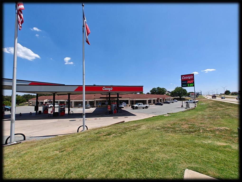 This multi-tenant retail property is located at hot location in Sherman, Texas. The property features 18,885 square feet of building space on 3.559 acres of land, with additional buildable land available behind the existing building. The property is currently occupied by a diverse mix of tenants including massage, bookkeeping, gas station, gold and silver shop, donut shop, pizza shops, and ice cream shop.

The property is commercially zoned and allows for professional offices, salon suites, recreational facilities, gym, retail shops (except smoking or vape shops), shopping, cafe, restaurants, and other businesses. The property is anchored by Casey's General Stores convenience store and gas station, providing strong traffic and visibility.

With a current pro-forma NOI potential of $265,226, this property offers significant value-add opportunity through leasing the vacant spaces. The property is diagonally located near Walmart Neighborhood Market, providing excellent co-tenancy and traffic generation.